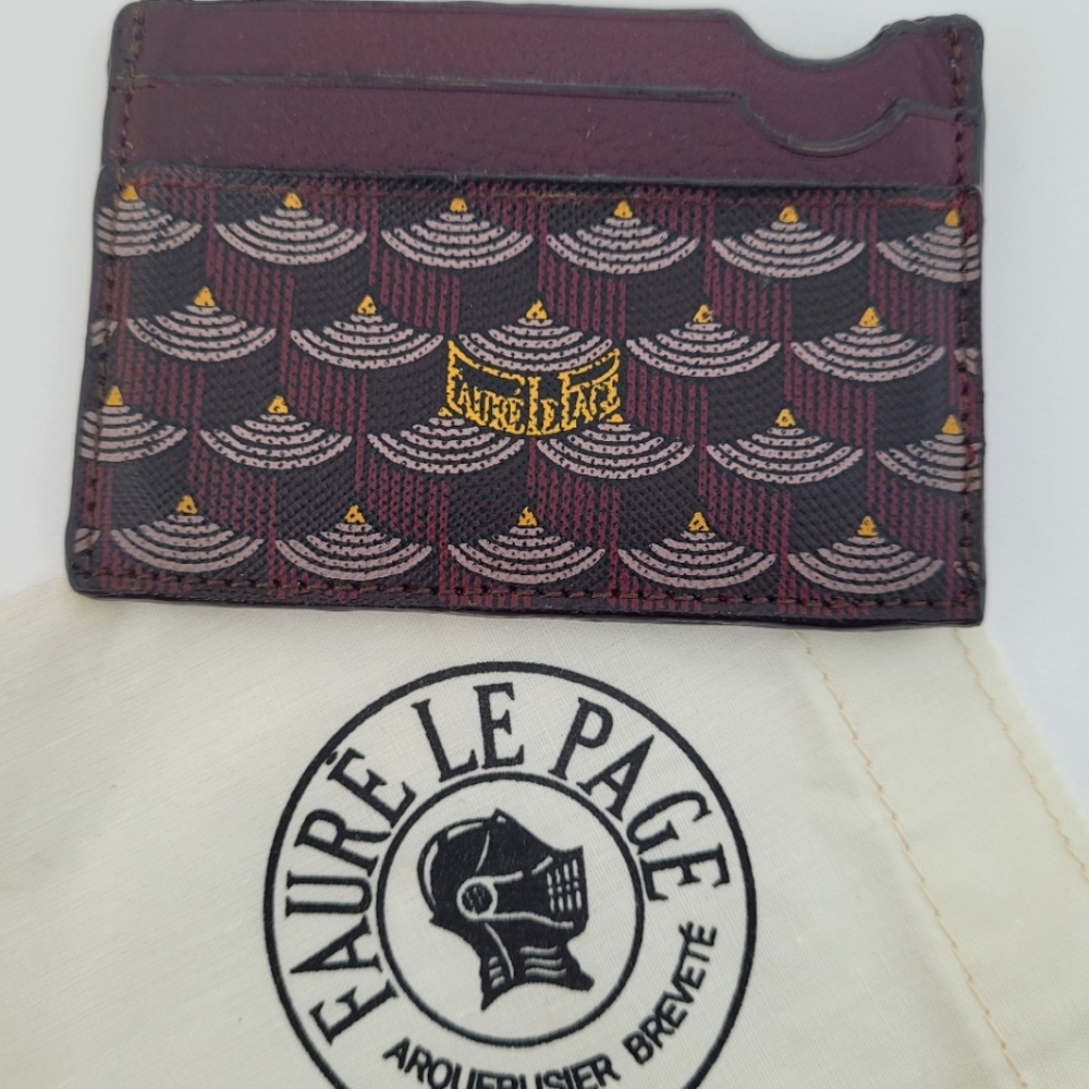 Great condition Fauré Le Page wallet with iconic print in maroon color